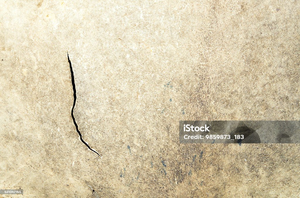 close up of an animal hide used as a drum A close up of an animal hide used as a drum cover with a large crack in it. Abstract Stock Photo