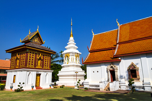 Outdoor church and white pagoda at Wat Hua Kuang, Nan,Thailand
