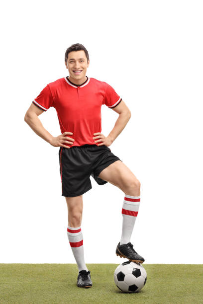 istock Soccer player stepping over a ball on grass 521048098