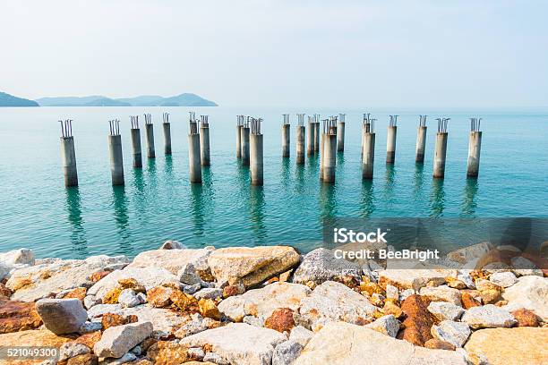 Concrete Piles With Iron Stock Photo - Download Image Now - Abandoned, Coastline, Concrete