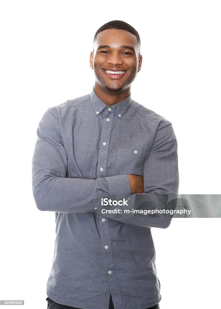 Cheerful african american man smiling with arms crossed Portrait of a cheerful african american man smiling with arms crossed on isolated white background Men Stock Photo
