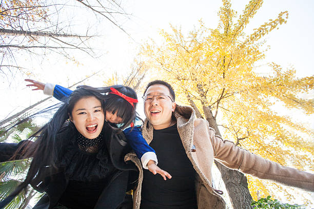 istock happy family togetherness portrait in forest 521069659