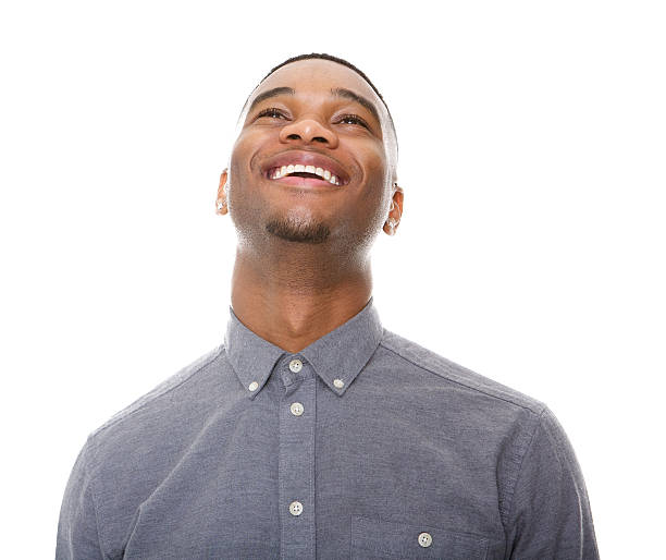 istock Black man laughing and looking up 521072353