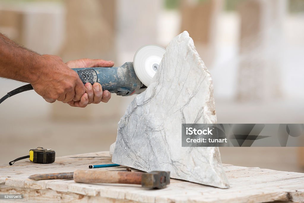 Sculptor Working Sculptor is creating a sculpture. Adult Stock Photo