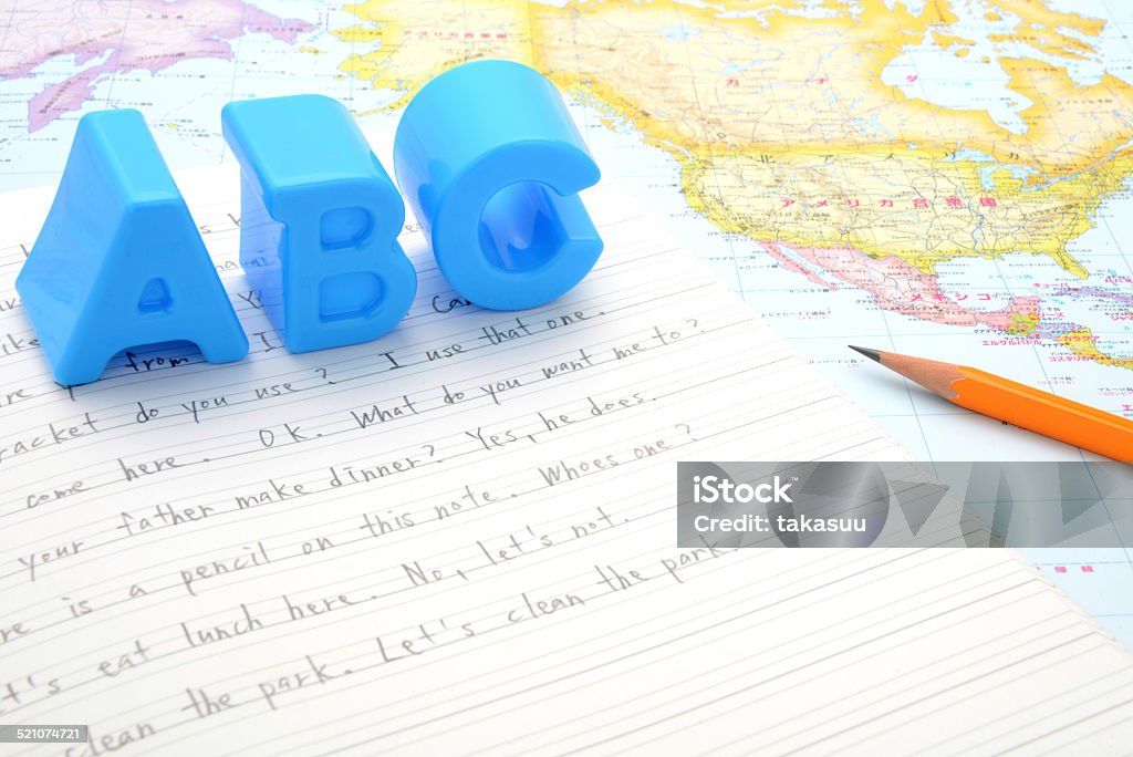 English education images English education images, note and alphabet toys on world map Alphabet Stock Photo