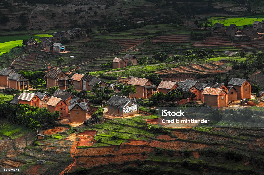 Madagascar Small village on the hill with green gardens and red soil. Madagascar Madagascar Stock Photo