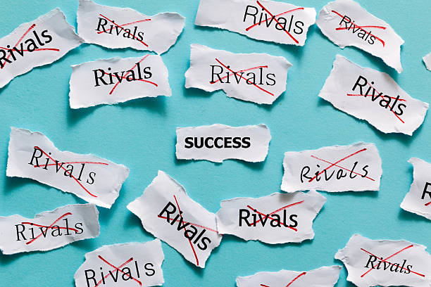 istock defeat business competitor and success concept 521075243