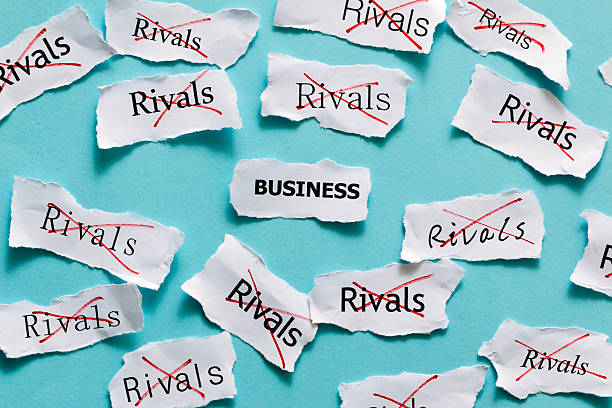 istock defeat business competitor and success concept 521075261