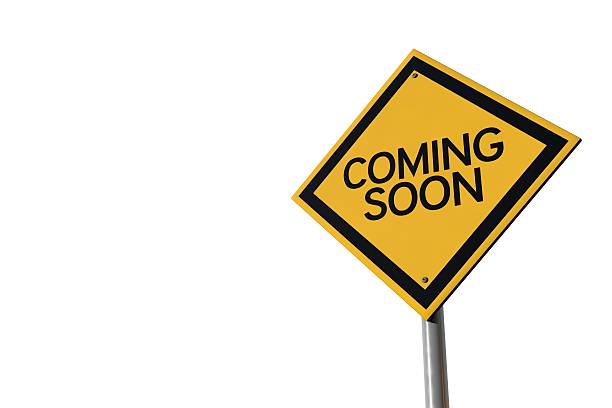 istock Coming soon yellow highway road sign 521075968