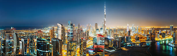 istock Panoramic view of Dubai by night. Travel background. 521077228