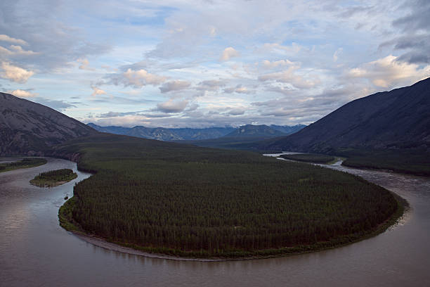 istock Top view of a big river meander. 521077492