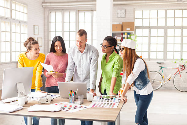 istock Young creative designers elaborating their ideas at the office 521077526