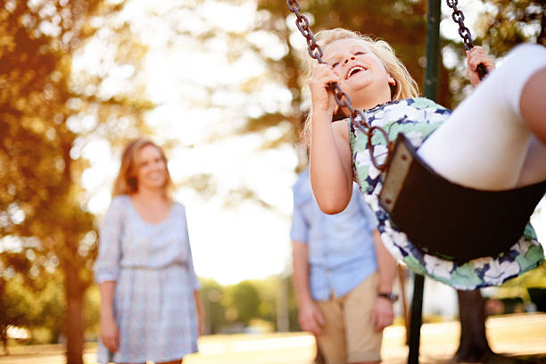 istock So much fun on the swings 521078414