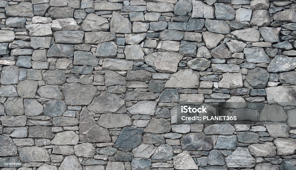 Stone wall Flat stacked stone. Background and Texture for text or image. Stone - Object Stock Photo