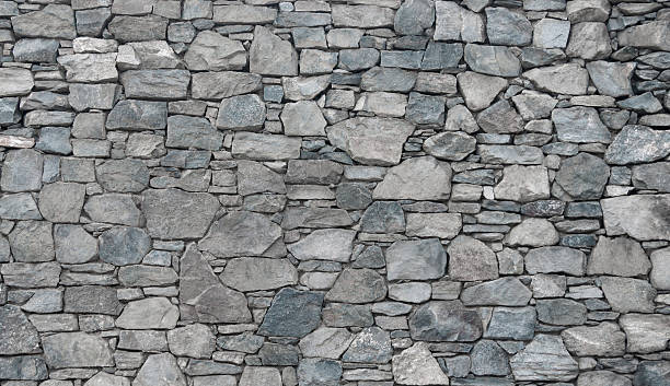 Stone wall Flat stacked stone. Background and Texture for text or image. stone wall stock pictures, royalty-free photos & images