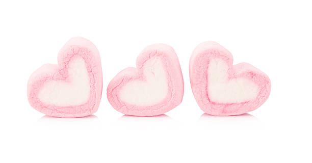 istock Pink sweet heart marshmallow on white background 521083148