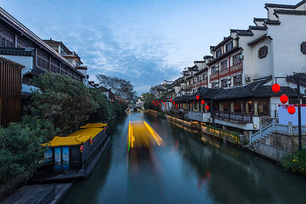 istock Nanjing Confucius Temple and boat on the River 521086498