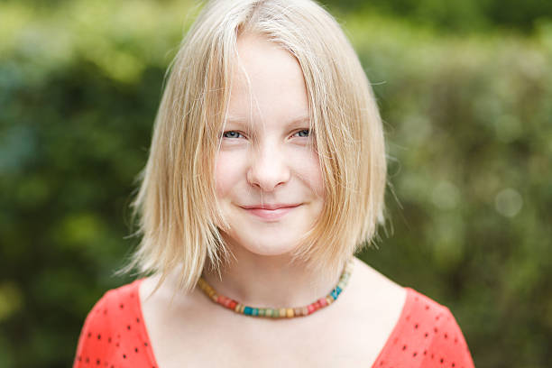 istock Sly smile girl 521087452