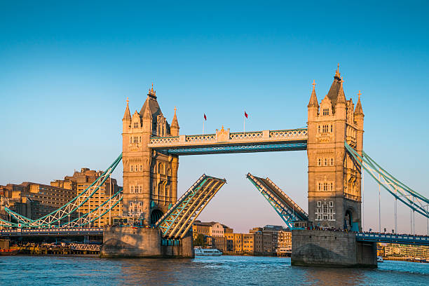 istock Tower Bridge ‘open’ over the River Thames in London, UK 521088168