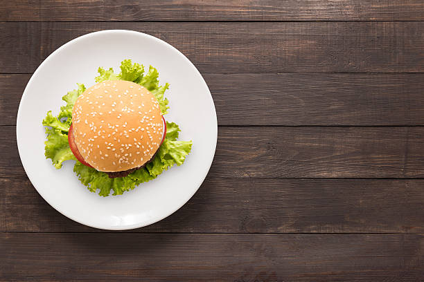 istock Top view BBQ burger on white dish on wooden background 521088700