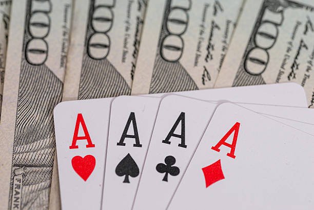 istock four poker aces with us dollar 521089164