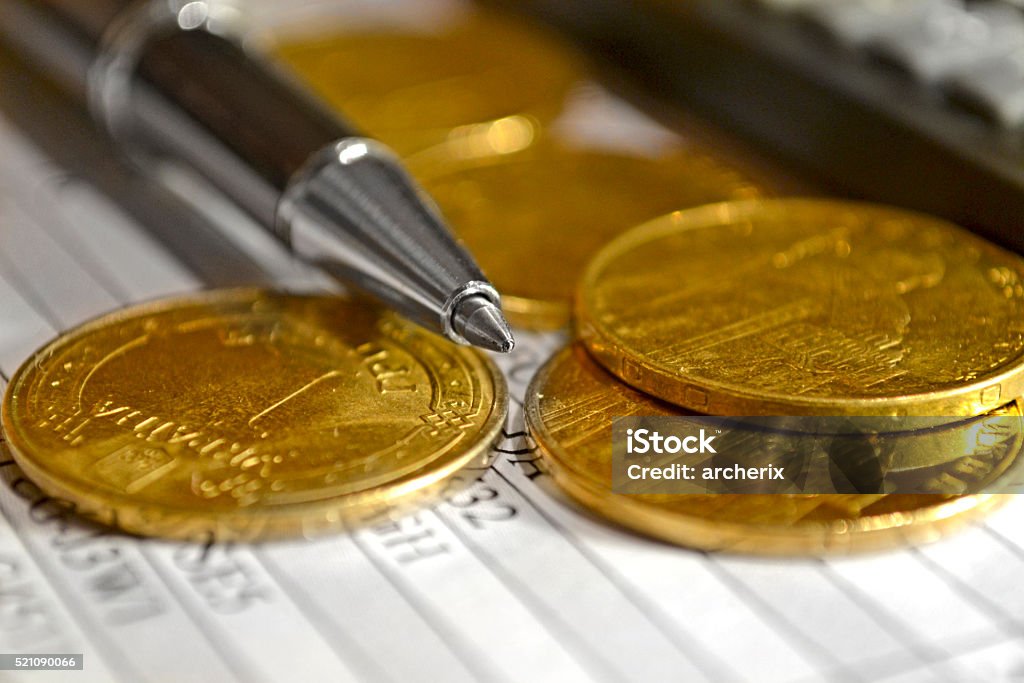 Financial background Financial background with money, calculator, table and pen. Analyzing Stock Photo