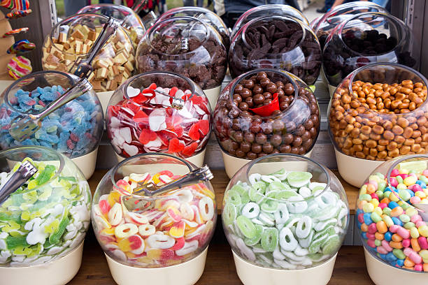 istock Colorful candies in glass bowls 521109749
