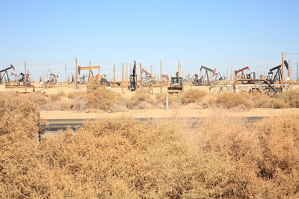 istock Pump Jack Oil Field Along A California Highway 521113725