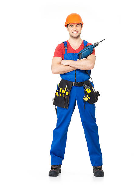 istock Handyman with tools full portrait isolated 521114499