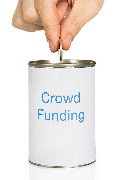 istock Person Donating Money 521124582