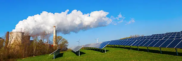 solar collectors and fossil-fuel power station