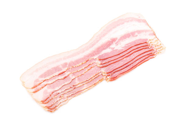 istock Slices of bacon isolated on white background 521127480