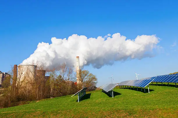 solar collectors and fossil-fuel power station