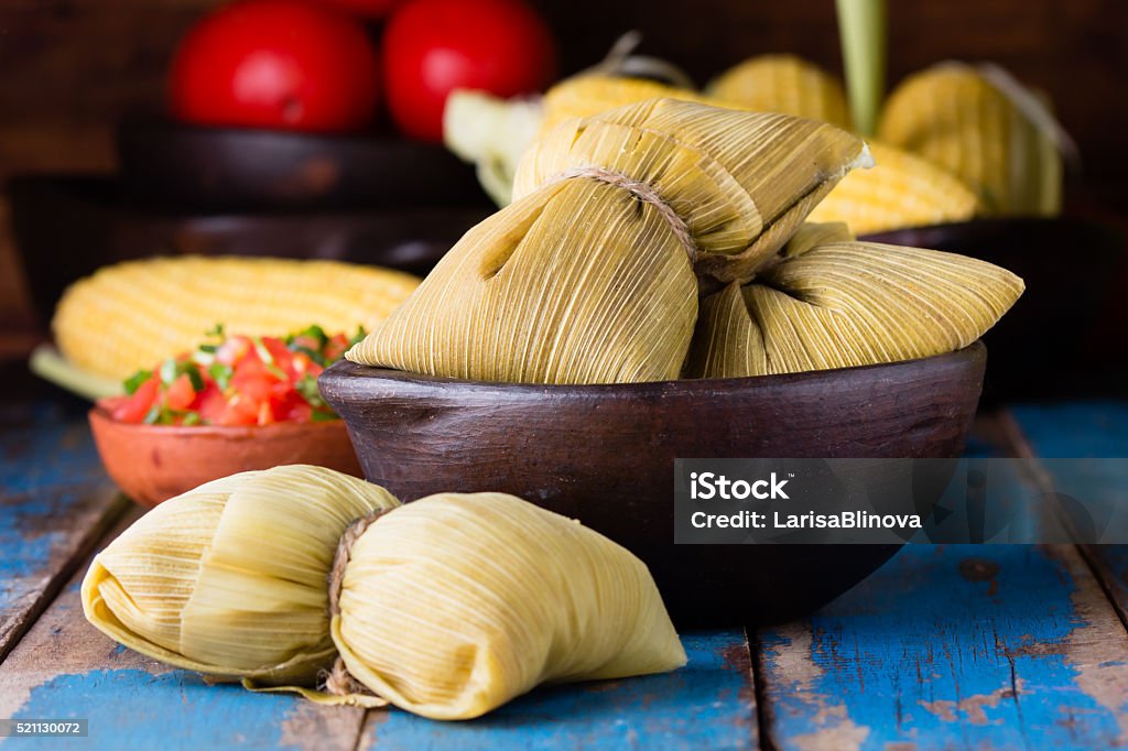 Latin American food. Traditional homemade humitas of corn Latin American food. Traditional homemade humitas of corn and leaves Food Stock Photo