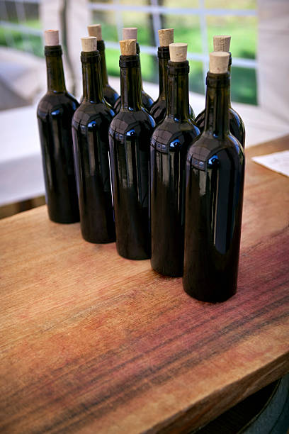 Red wine on a wooden table in a winery