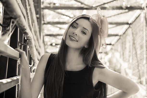 istock Young woman smiling wearing hat 521133585