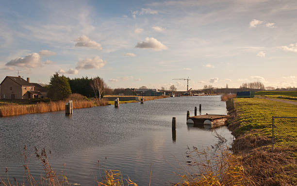 istock Glance over the small Roode Vaart canal in the Netherlands 521134585