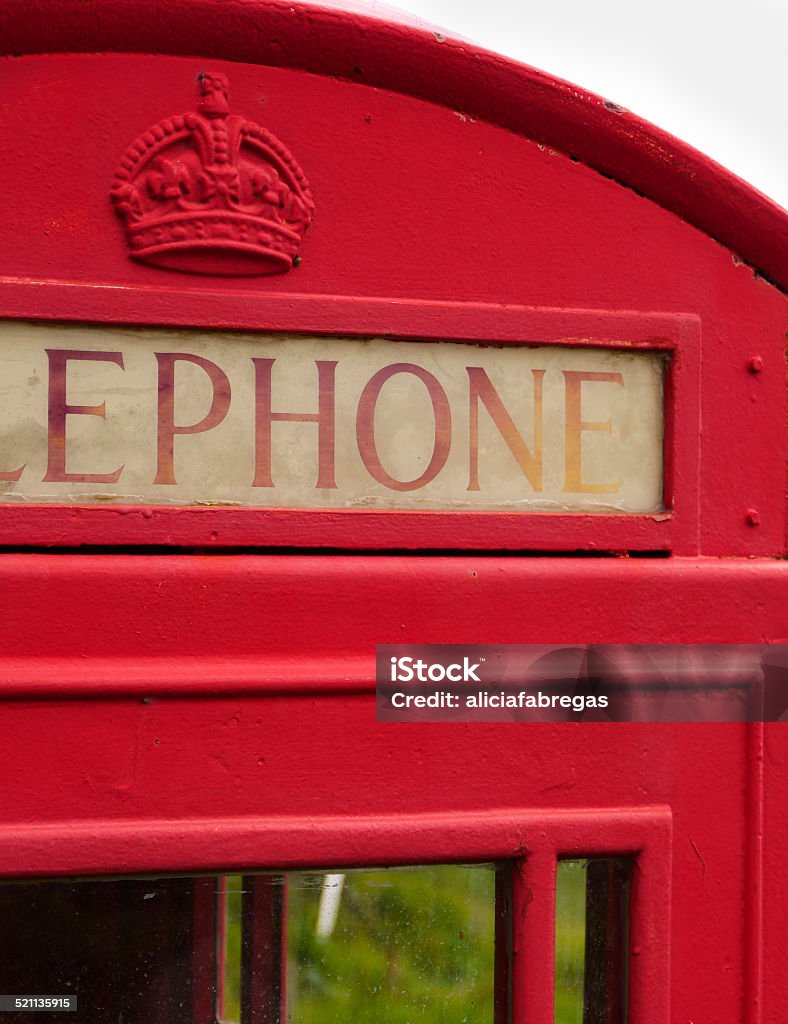 Telephone booth in UK A typical red telephone booth in UK. Communication Stock Photo