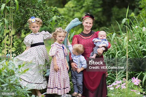 Mother And Daughters In Edwardian Dress Stock Photo - Download Image Now - 2-3 Years, Alertness, Arts Culture and Entertainment