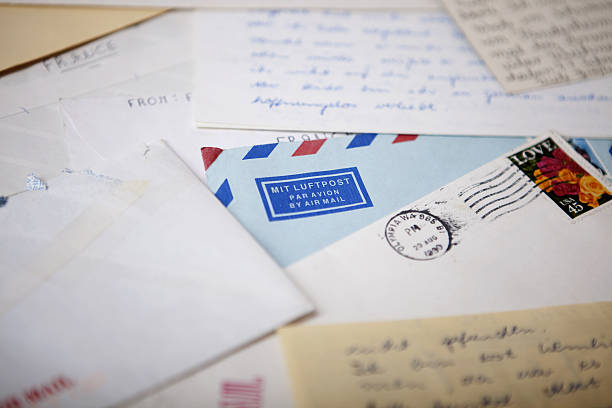 istock airmail envelope in middle of letters and postcards 521136579
