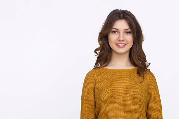 istock Pretty girl in orange sweater 521136942