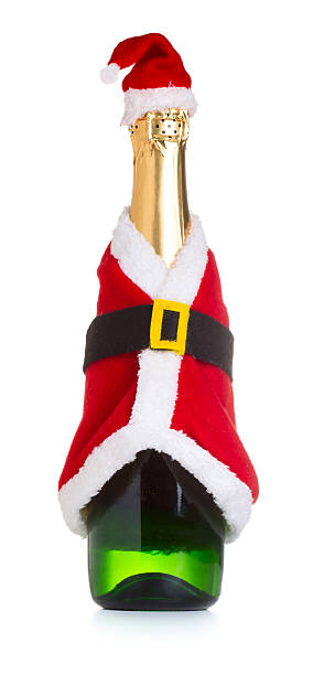 istock Champagne bottle in a Christmas decoration santa clothes 521137111