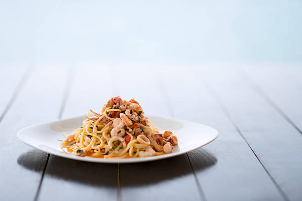 Spaghetti with Mixed Raw Seafood Plate by the Sea