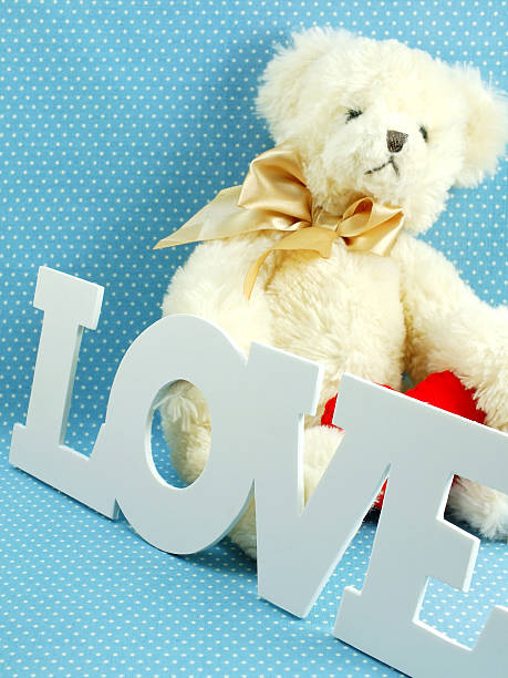 istock cute teddy bear concept valentine day 521138116