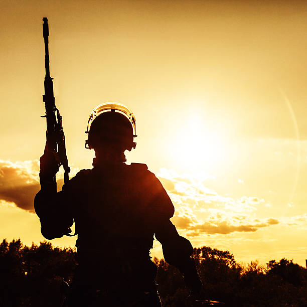 istock police officer with weapons 521138291