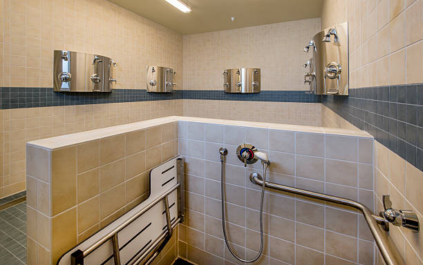 istock Locker Room Showers with Handicapped Access. 521138417