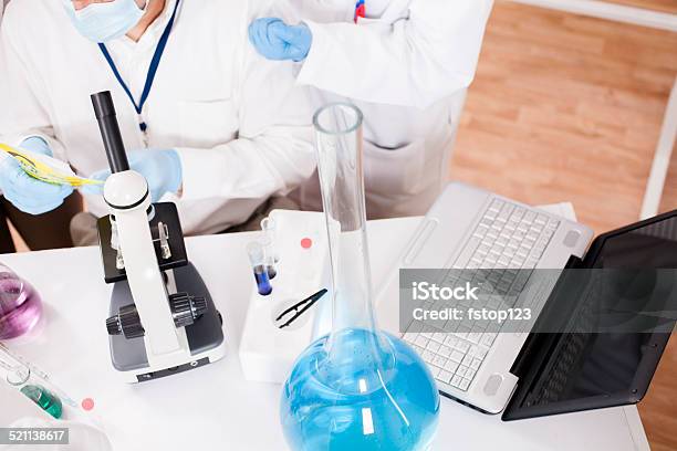 Scientists In Research Laboratory Chemicals Laptop Microscope Stock Photo - Download Image Now