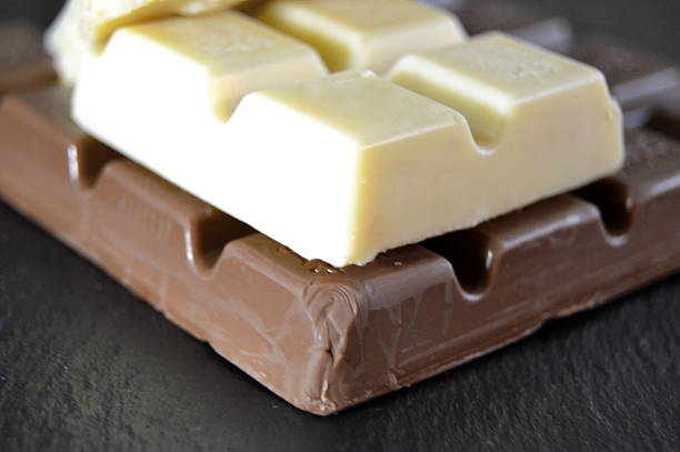 istock Tablet of black and white chocolate 521138645