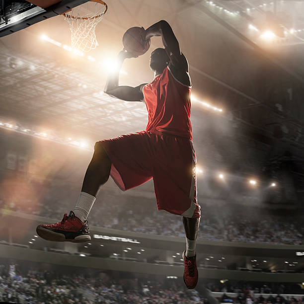 istock Pro Basketball Player About To Dunk 521139225