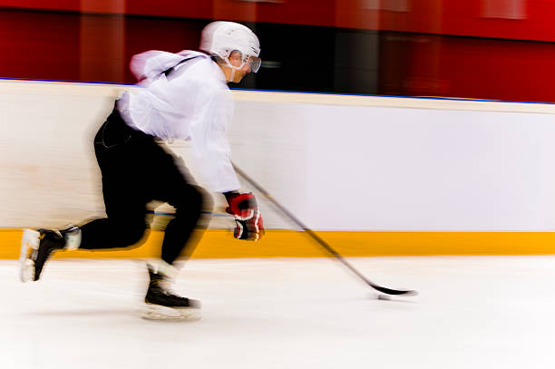 istock Ice Hockey Player in the Fast Moving Action 521139385